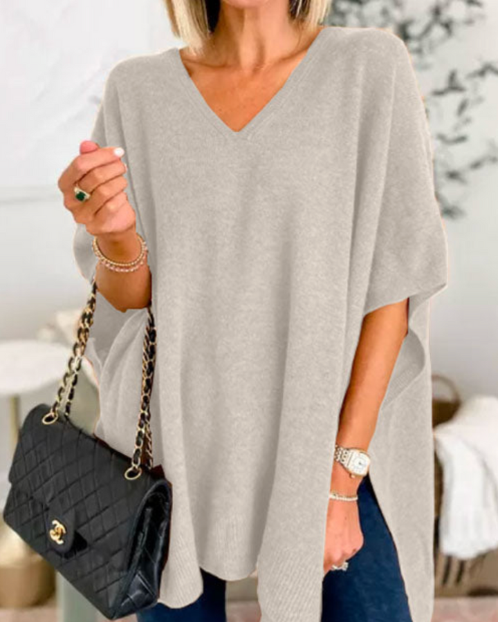 ERICA - Solid knit poncho with V-neck and wide cut